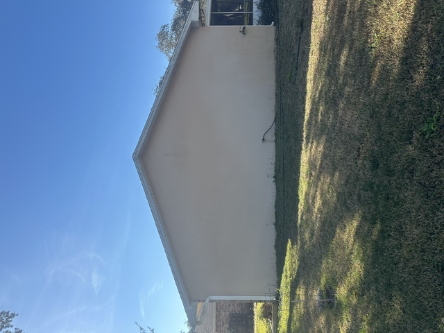 Edgewater Florida stucco home before painting north wall